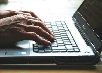 laptop-keyboard-hands-elderly-pensioner-700.jpg